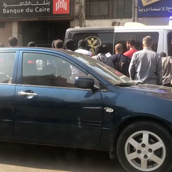 About 2:00 PM, Ramses Street. Lined with armed men and accomplices dressed in civilian clothes, holding walkie talkies and some with masks. They are monitoring all movement. 